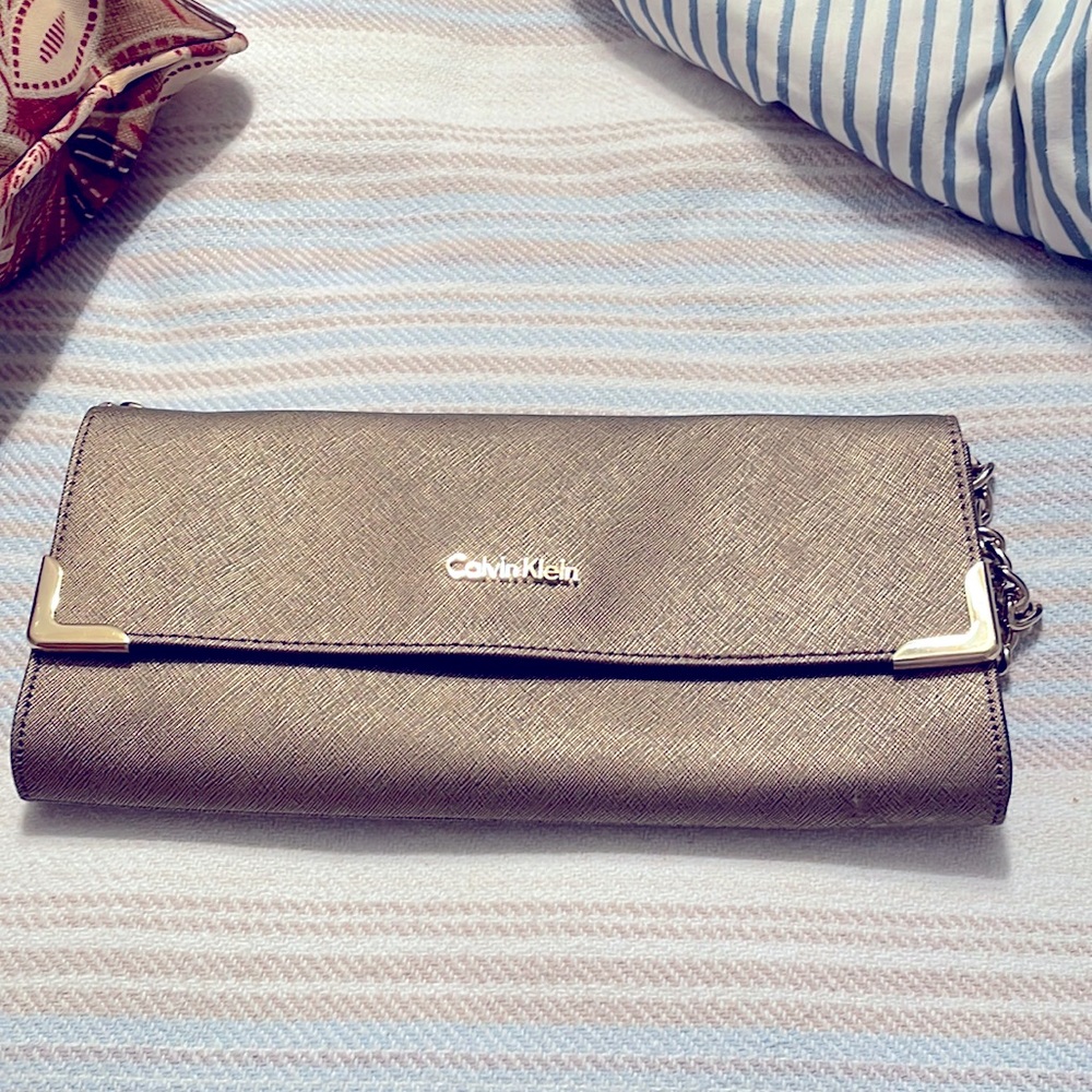 COPY - Calvin Klein clutch pocketbook. Like new. Gold color. Beautiful.